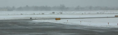 Snow blowing at the airport