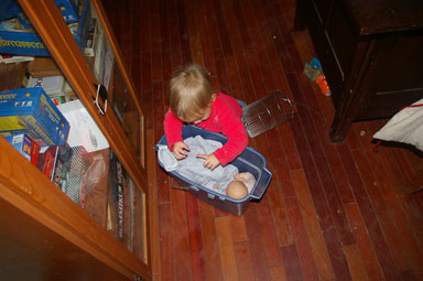 Sungiva builds a removable carseat for her doll.