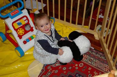 Sungiva plays with her panda.