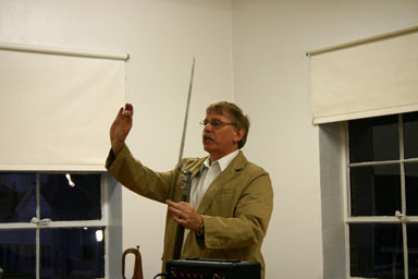 Tom Canfield demonstrates loading a Civil War rifle