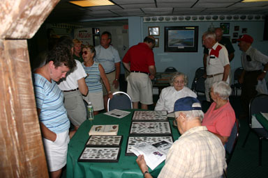 Looking at arrowheads and other artifacts found in the area