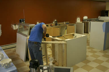 Evan Kurtz works on building