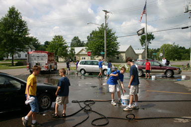 Scouts washing cars at Neptune Hose Company