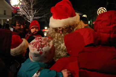 Santa talks with children.