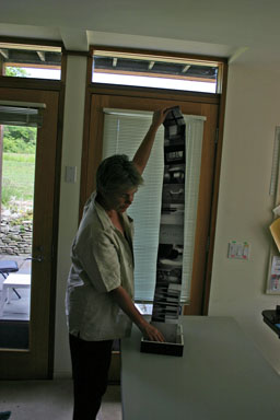 Photographer Gina Murtagh shows off a book of photos she created