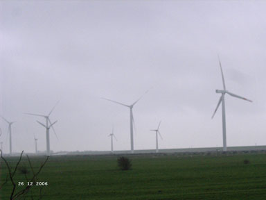 A range of windmills near the North Sea.