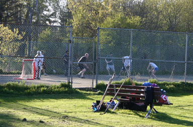 Hockey on the tennis court.