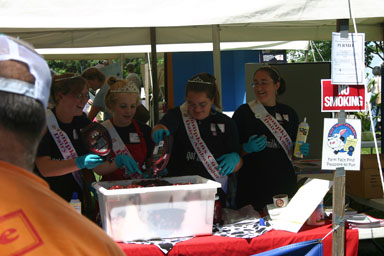 Dairy Princess Lacey Foote and the Dairy Ambassadors make a sundae.