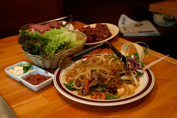 Japchae, with Kalbi and bulgogi waiting to be cooked.