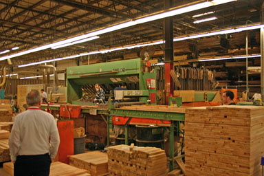 Machine-sorting lumber by size