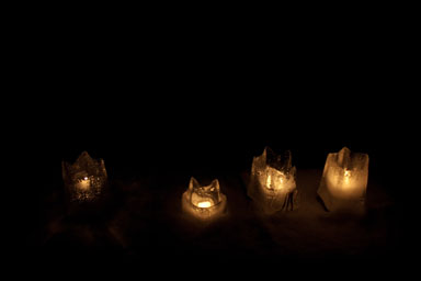 Old lanterns, molded by warmth and rain.