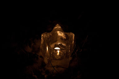 A single lantern, lighting the dark.