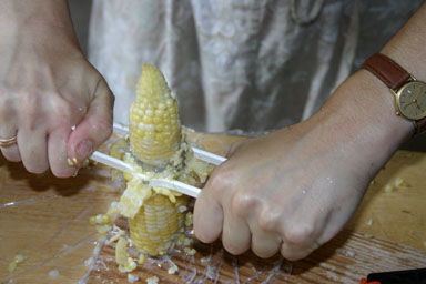 Freeing the kernels from the cob.