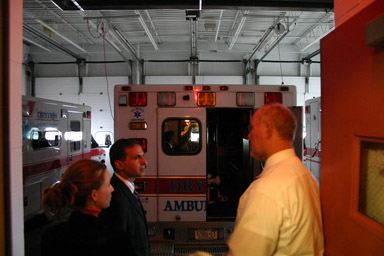 Mike Arcuri talks with Doug Cotterill at Dryden Ambulance