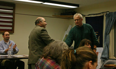 Mike Lane and Mike Hattery shake hands after Lane's concession