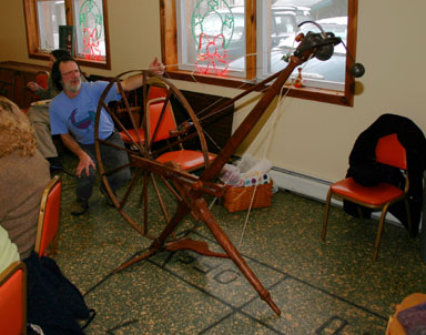Norm Hall sets up a pendulum spinning wheel